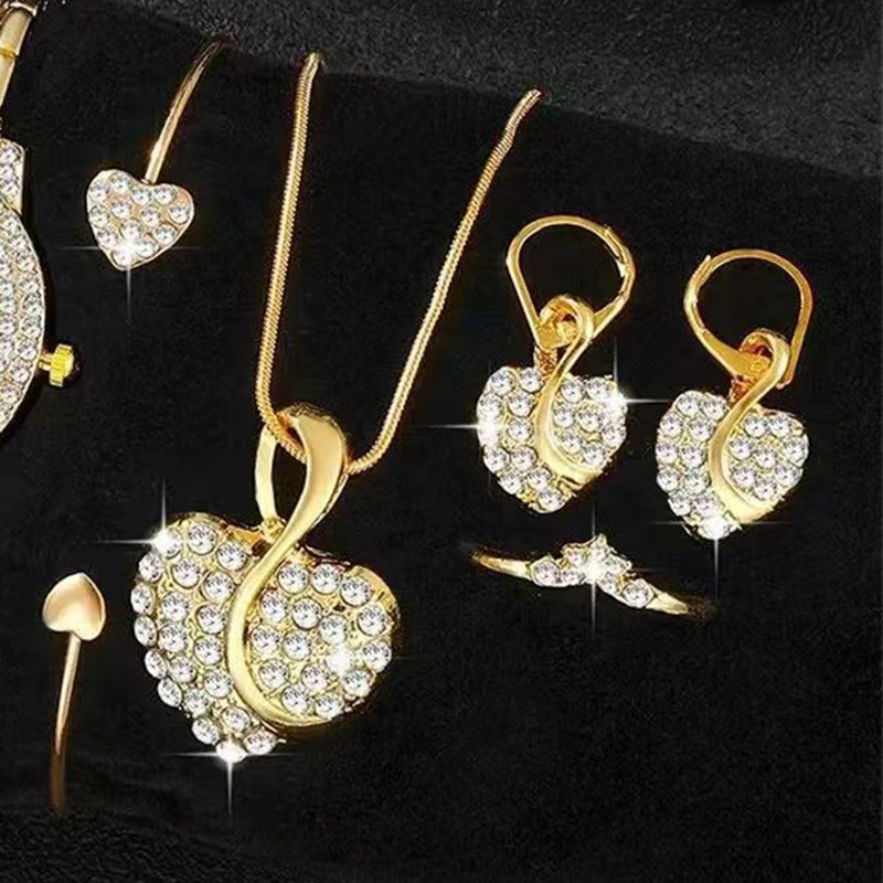 European and American fashionable love-shaped pendant clavicle necklace earrings ring bracelet four-piece heart wedding jewelry set