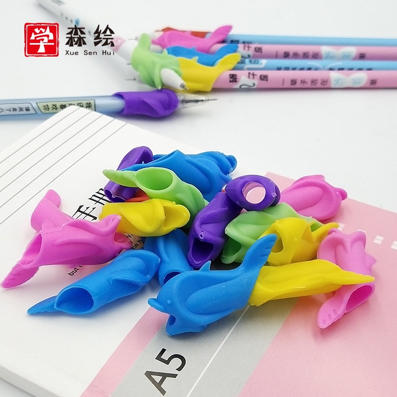 Dolphin fish pen holder silicone pencil student writing posture corrector corrector wholesale wholesale stationery