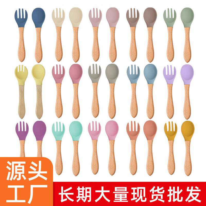Infant and child complementary food feeding tableware food grade silicone beech wood spoon and fork children's wooden handle soft silicone complementary food fork and spoon