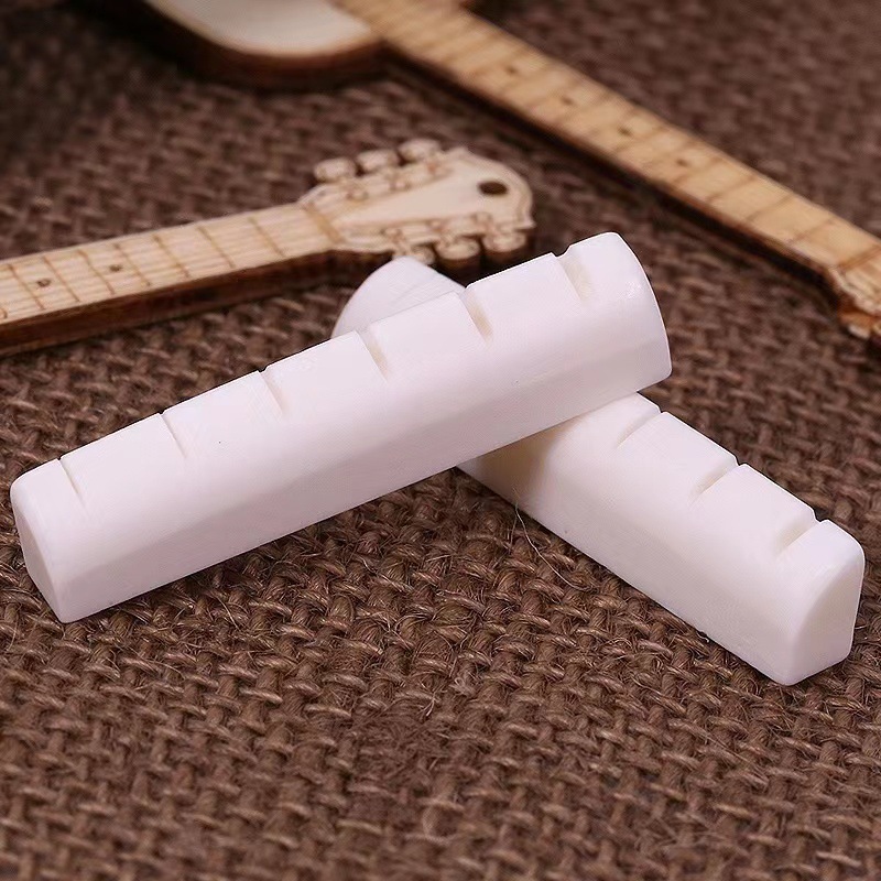 Folk classical guitar cow bone saddle upper and lower saddle saddle saddle bridge fixed string cone guitar accessories bridge code 5