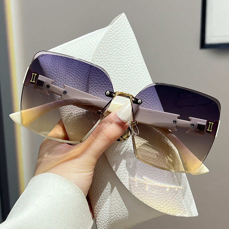 26 new internet celebrity frameless anti-UV trendy sunshade temperament large frame versatile sunglasses sunglasses women's glasses