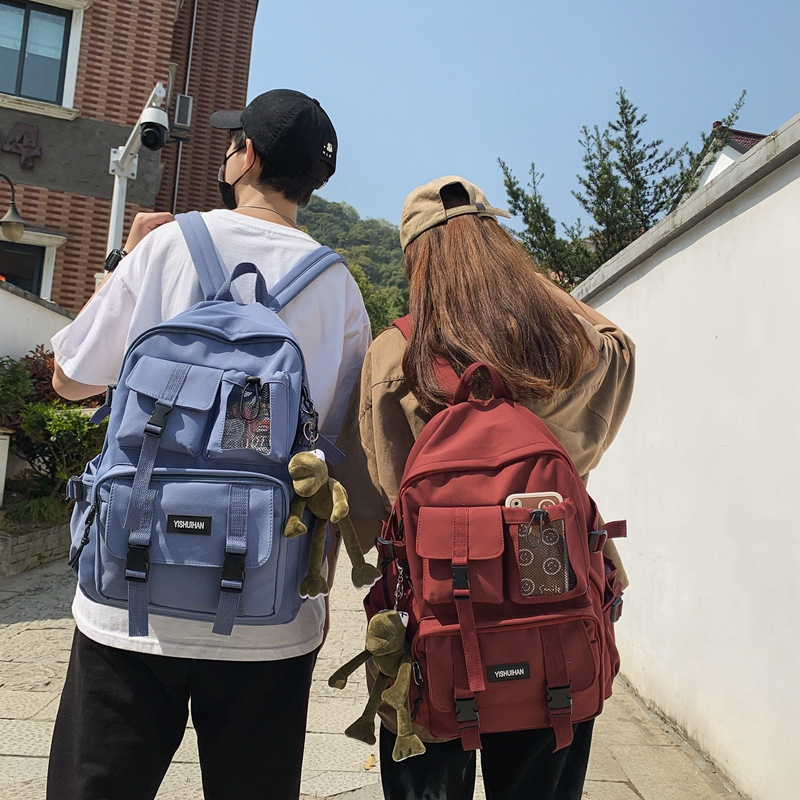 Casual and versatile men's and women's backpacks, cute pendants, trendy student bags, large-capacity workwear-style backpacks