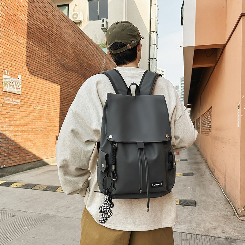 School bag, high school boy, college student, trendy brand, large capacity backpack, versatile backpack, lightweight spine protection backpack