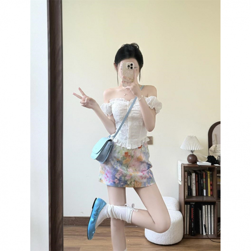Hot girl suit French hollow waist short-sleeved shirt women's summer blooming flower skirt hip-covering skirt two-piece set