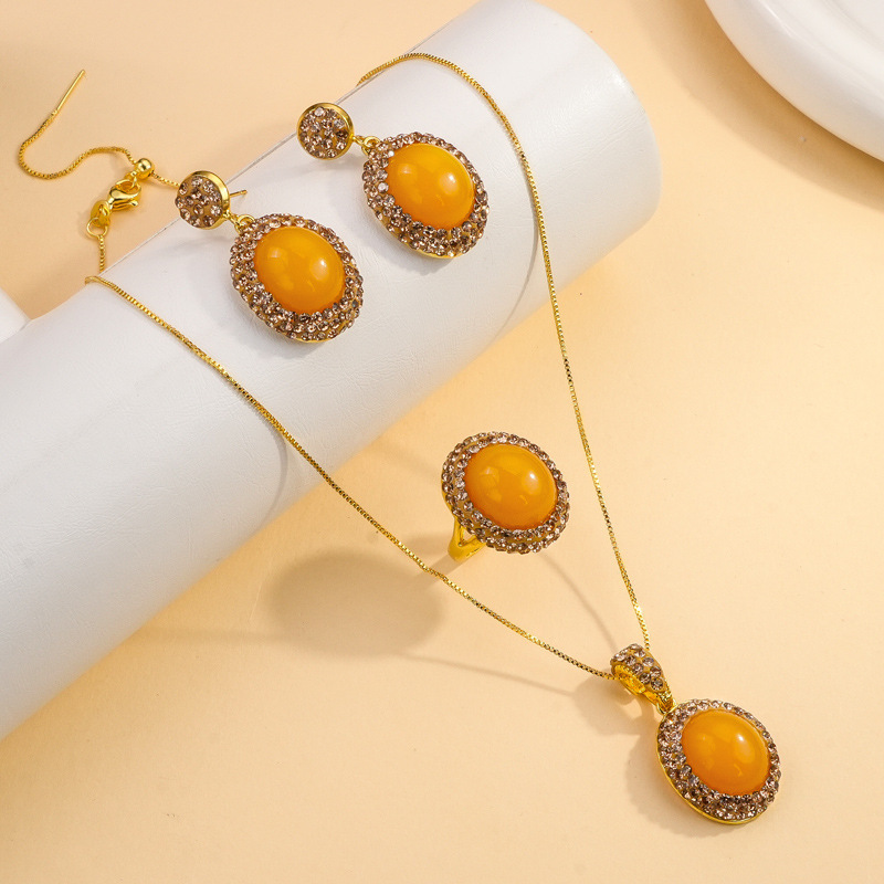 Beeswax jade inlaid zircon earrings necklace ring three-piece set women's retro light luxury jewelry ring wholesale